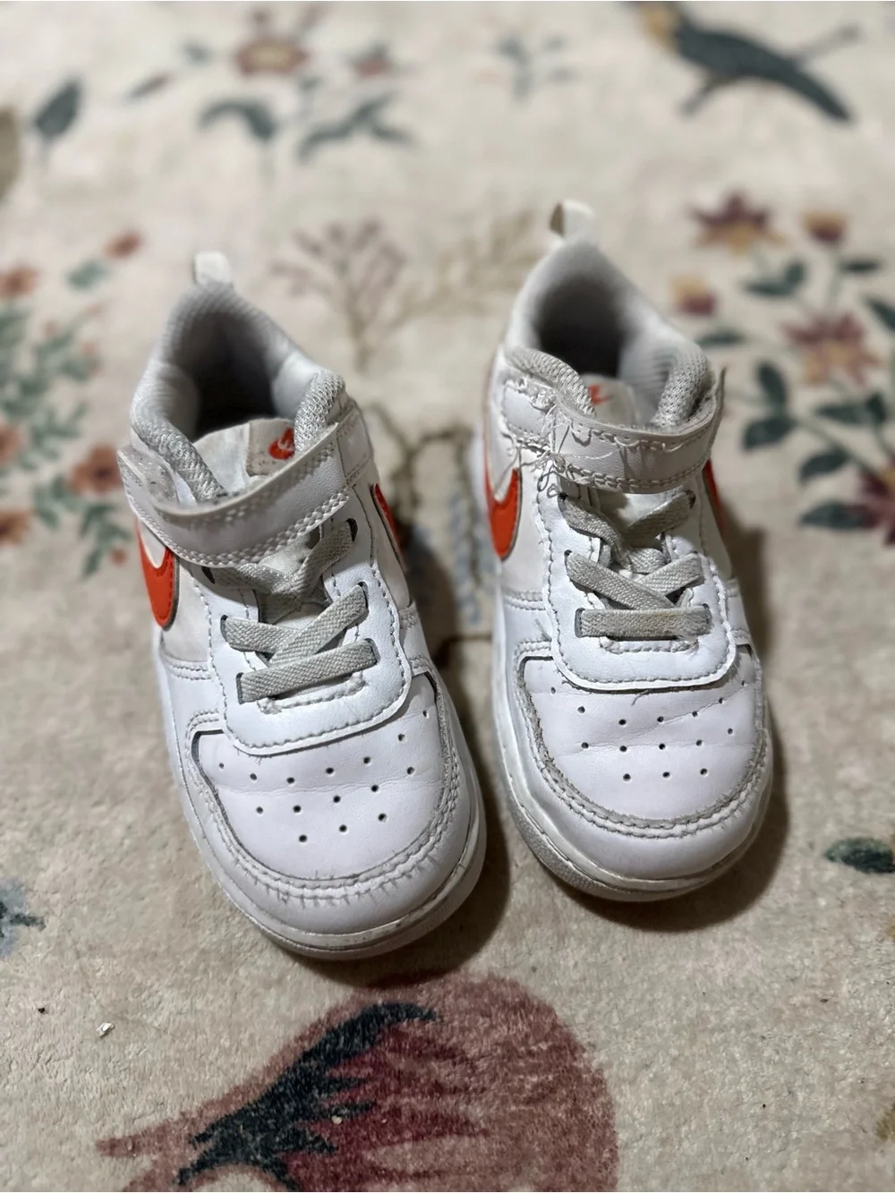 Nike White Kids Sneakers with Orange Swoosh Accent 8C